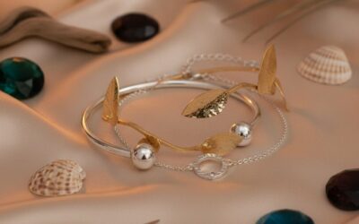 Verano en tu Piel: Joyas que Brillan con el Sol